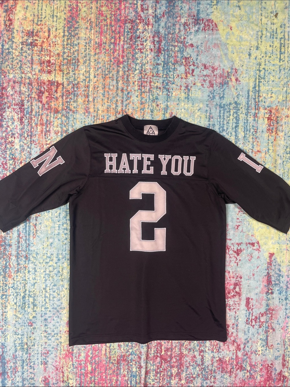 UNIF Black Jersey Tee with White Embroidered Varsity Graphic